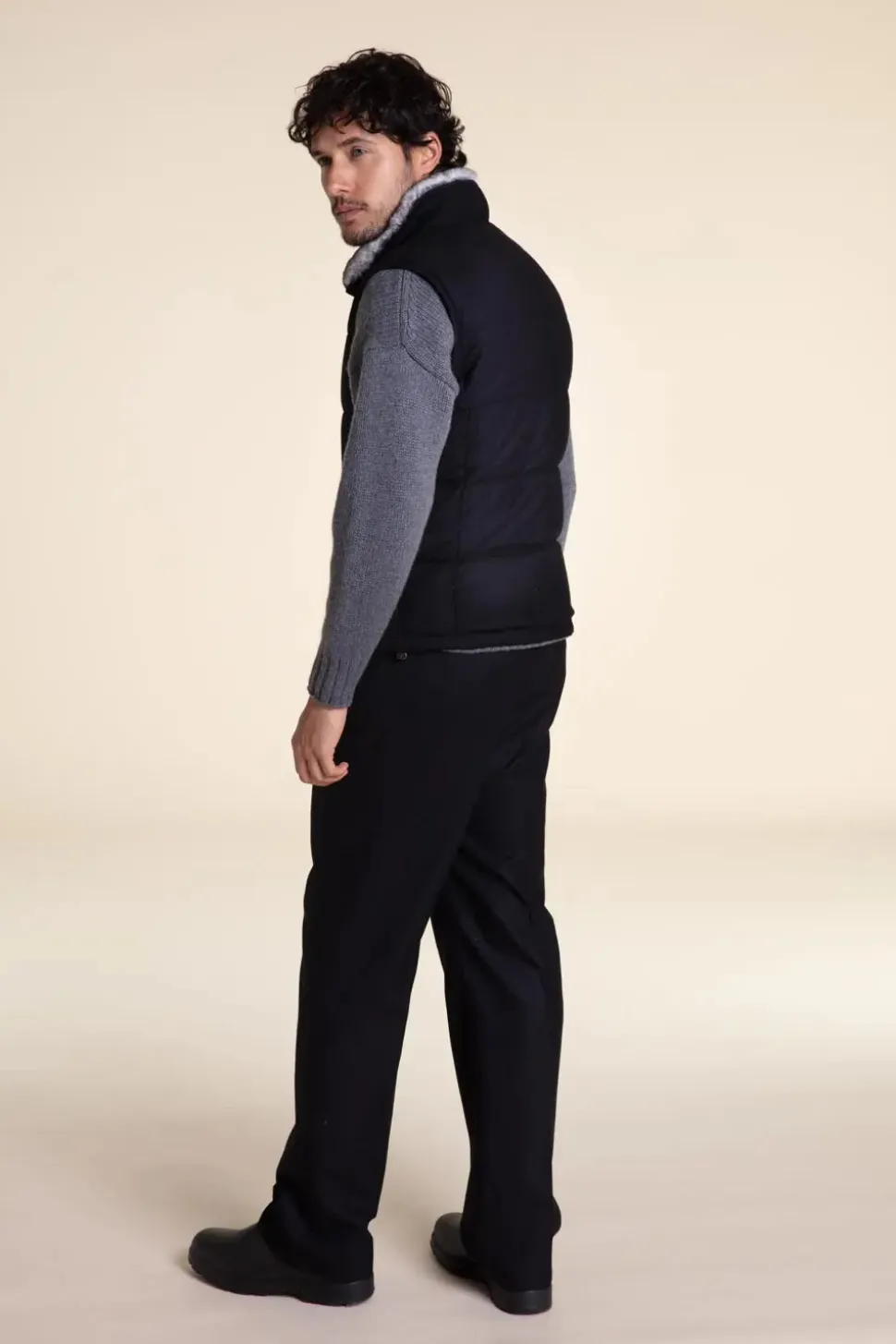Black and grey fur vest