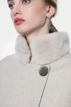 Cape with mink collar and pockets
