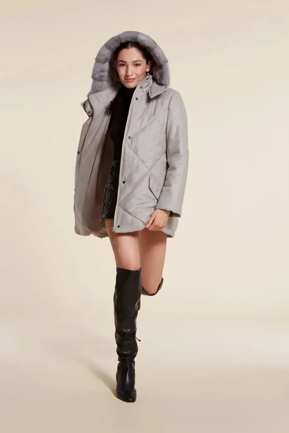 Grey puffer jacket with fur hood