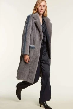 Mink coat with light blue inserts