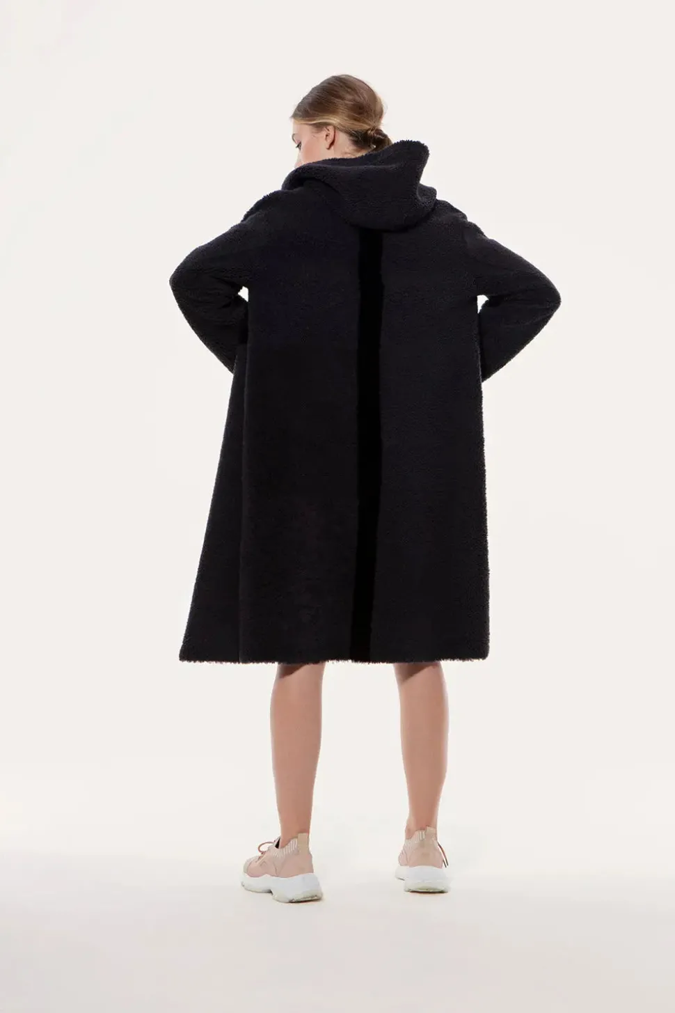 Reversible hooded sheepskin coat