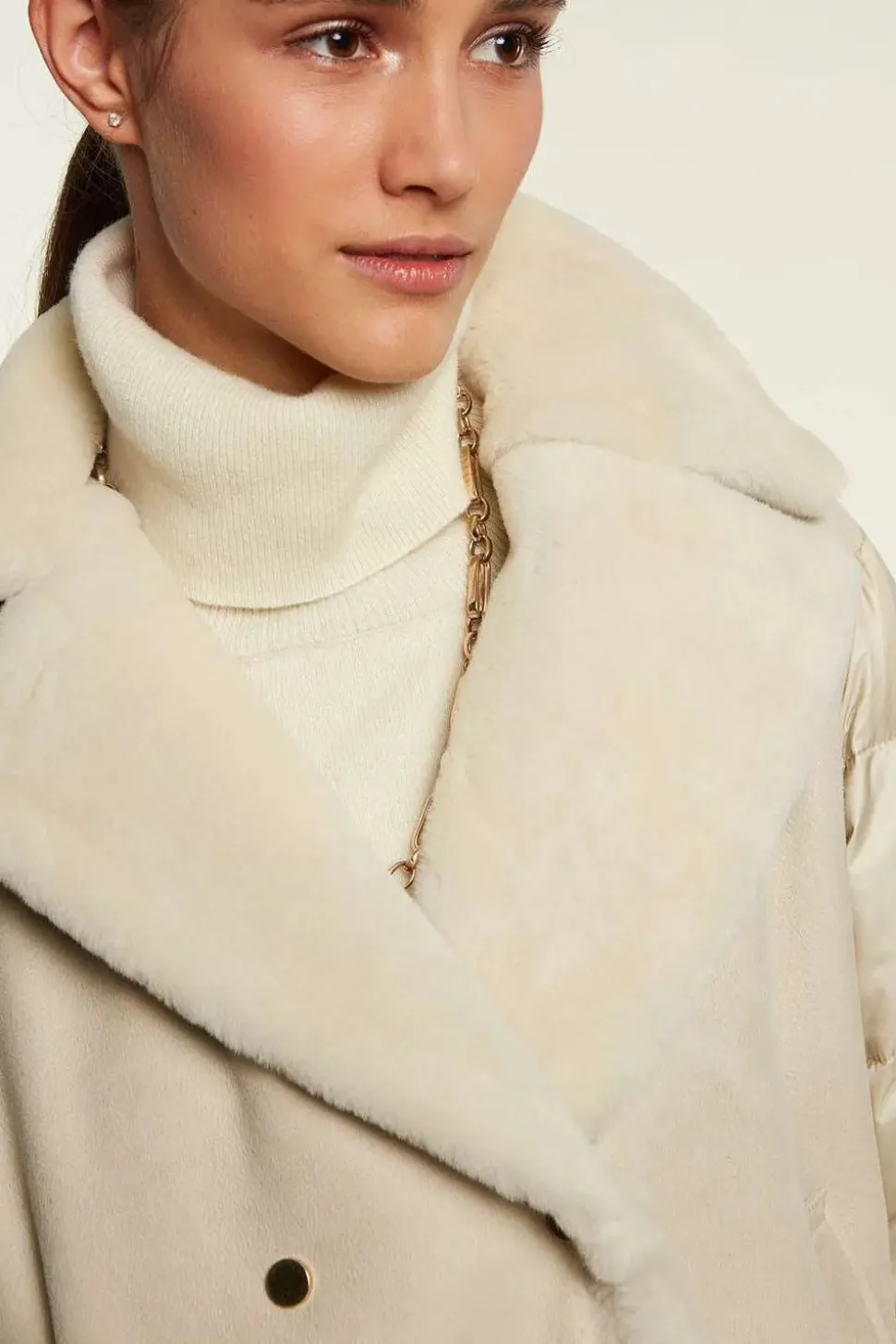 Shearling jacket with down inserts