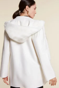 White parka with fur hood