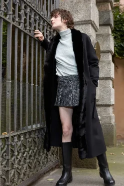 Womens long coat with black fur trimming