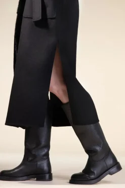 Womens long coat with black fur trimming