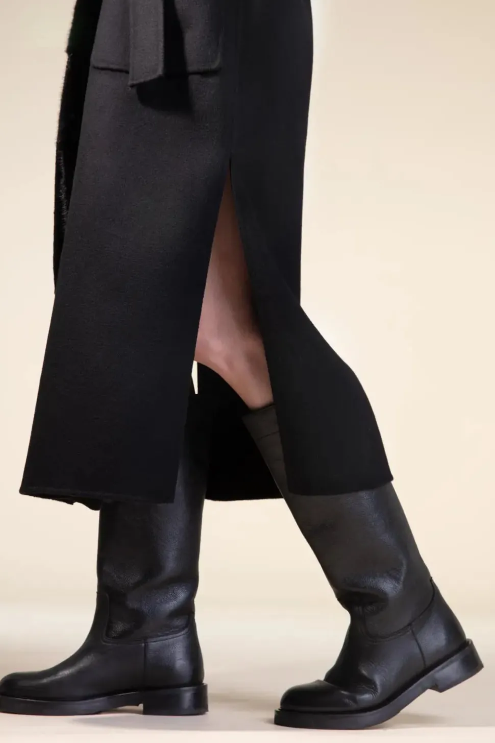 Womens long coat with black fur trimming